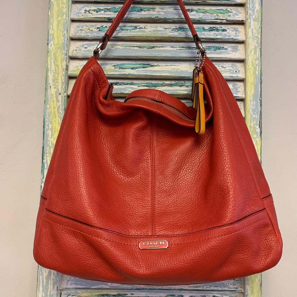 Coach red leather purse.
